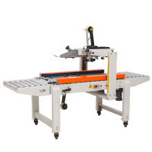 Small carton sealer packaging machine with side conveyor